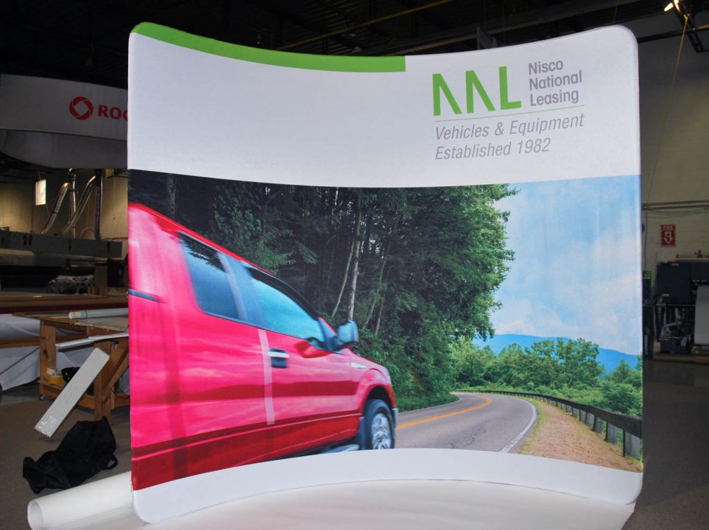Curved soho display featuring an image of a car