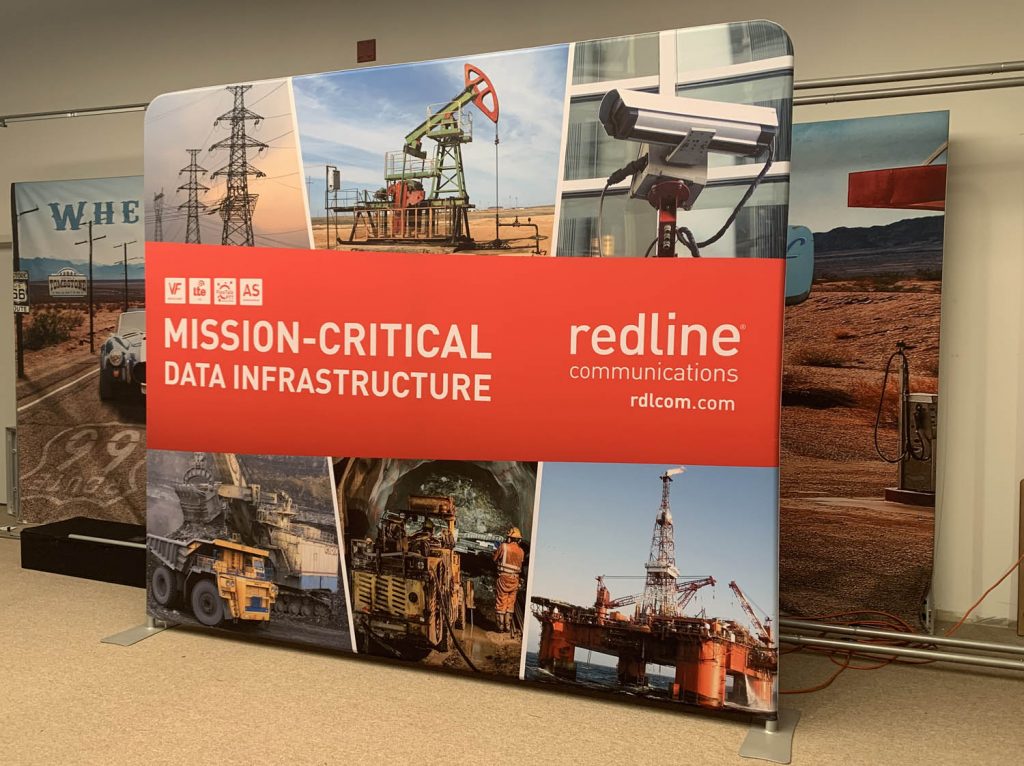 Portable soho display featuring images for oil rig works