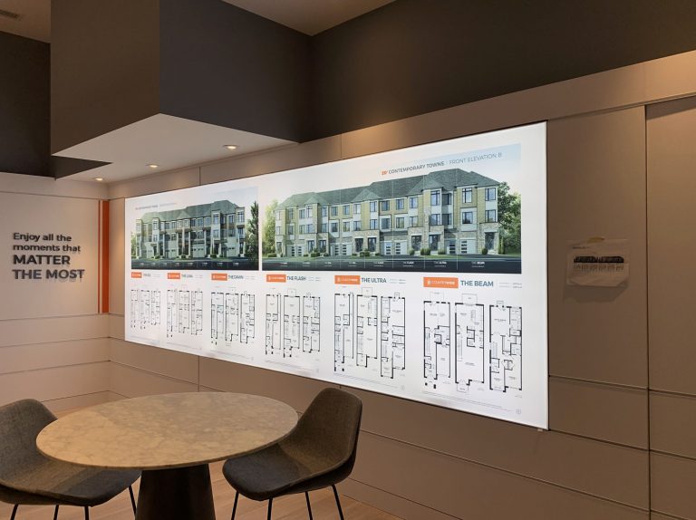 Wall-mounted LED lightbox featuring building floorplans